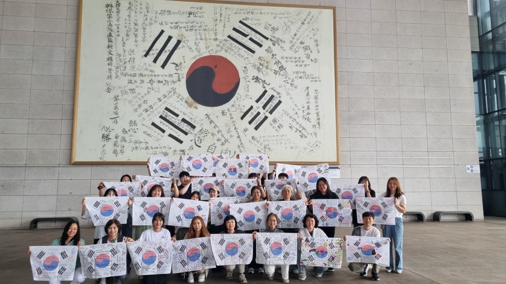 900여 명의 다짐, 35개 태극기로 모아 하나가 되다 - 관련이미지2